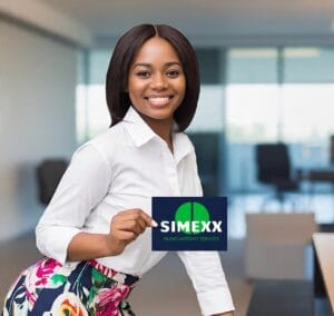 girl in flowered skirt holding up simexx poster